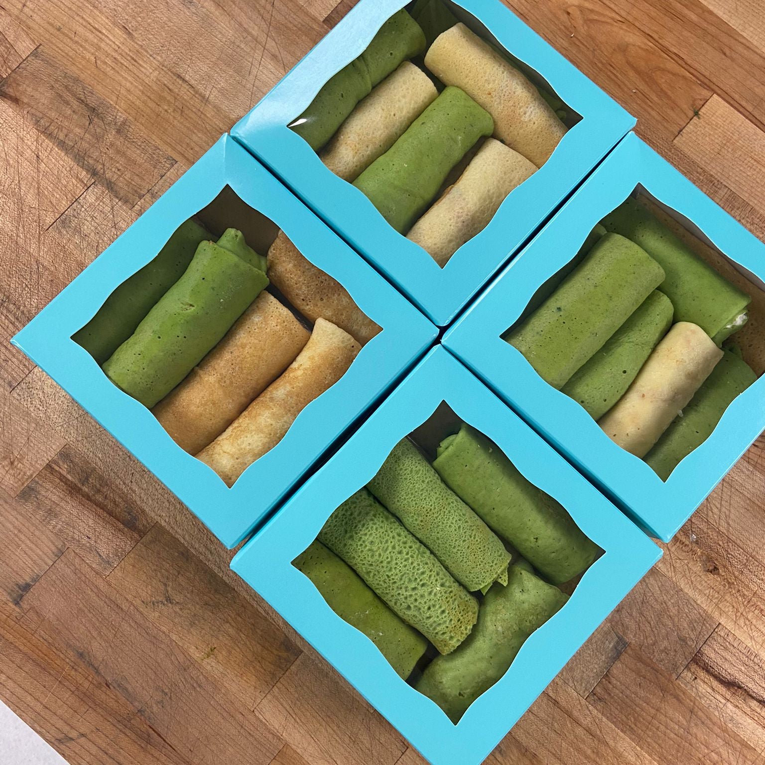 Traditional spinach crepes with salmon and cheese cream