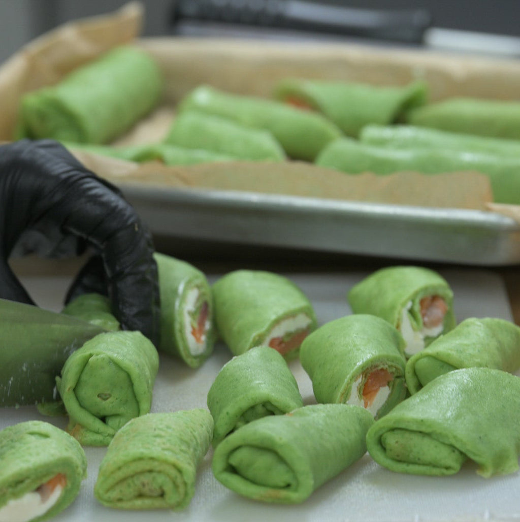 Traditional spinach crepes with salmon and cheese cream
