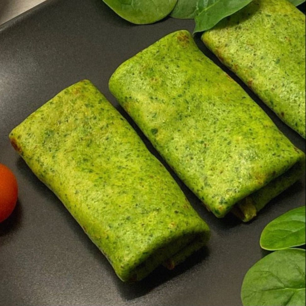 Traditional spinach crepes with salmon and cheese cream