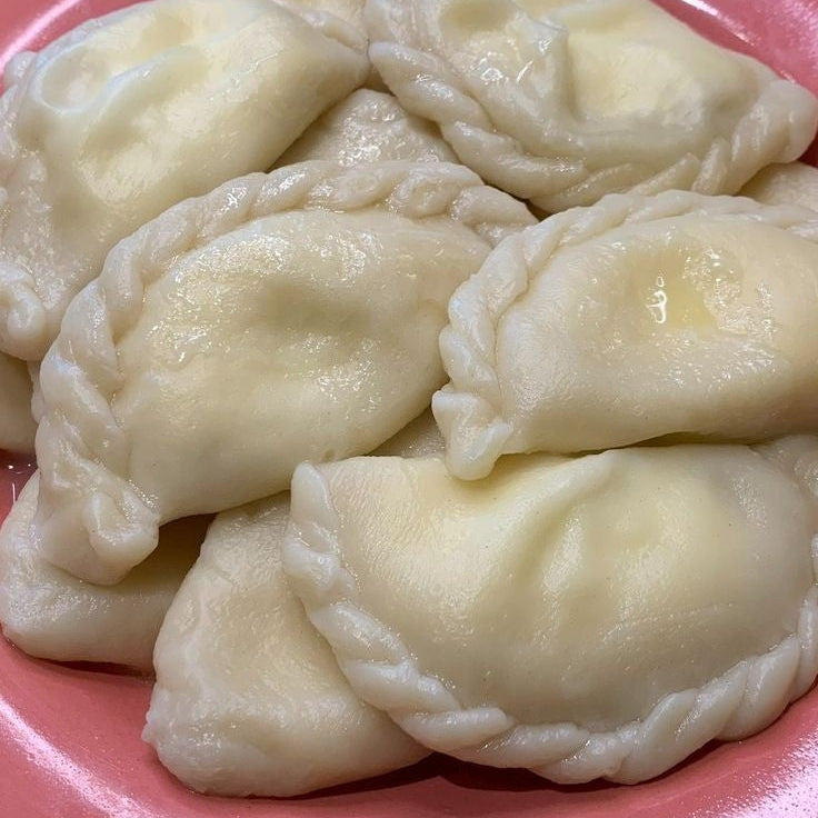 Traditional hand-made sweet cottage cheese pierogi